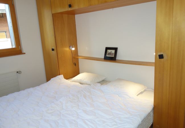 Schlafzimmer Wohnung G 010 in Veysonnaz in der Schweiz