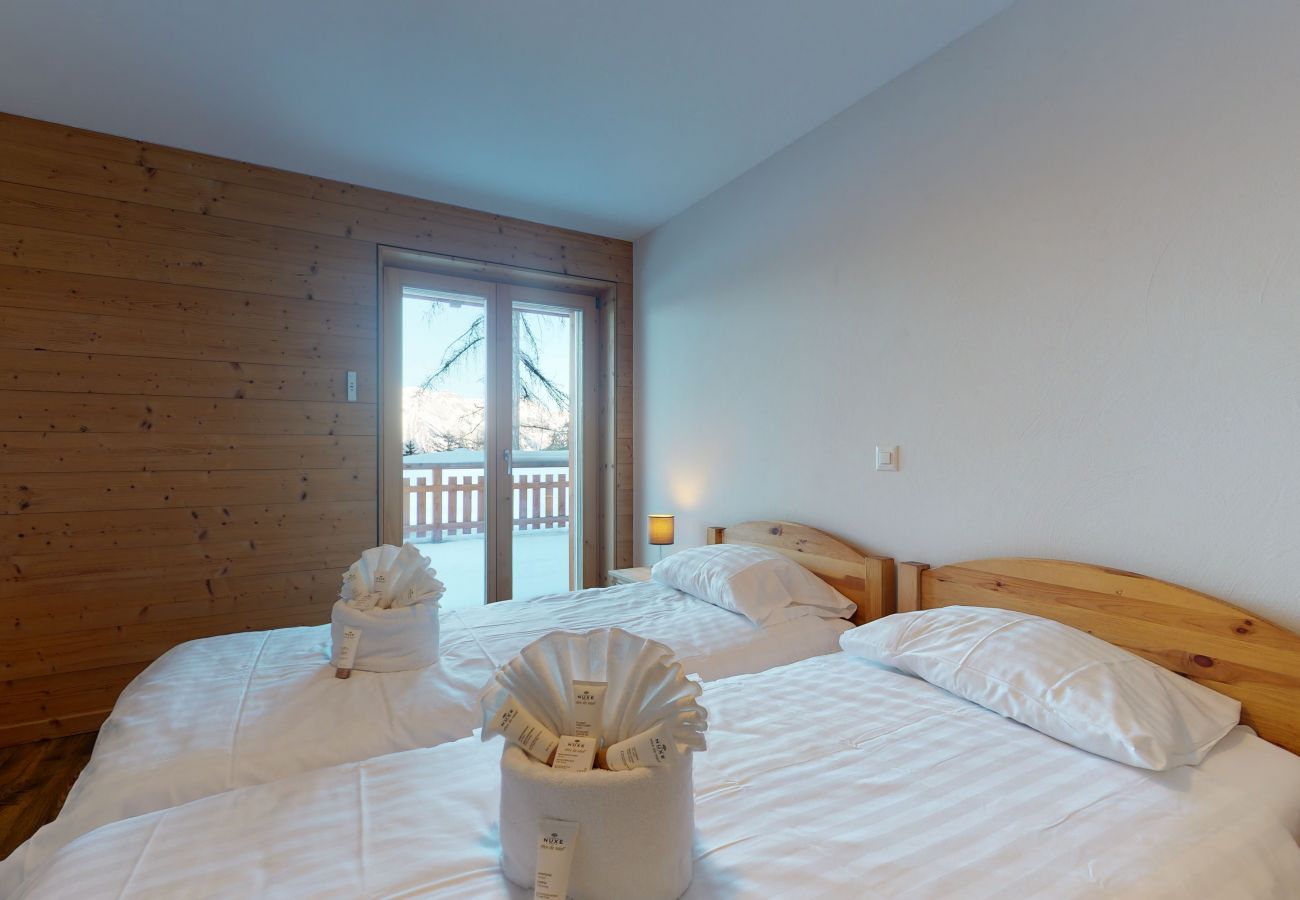 Schlafzimmer Apartment Les Mayens MB 001, in Veysonnaz in der Schweiz