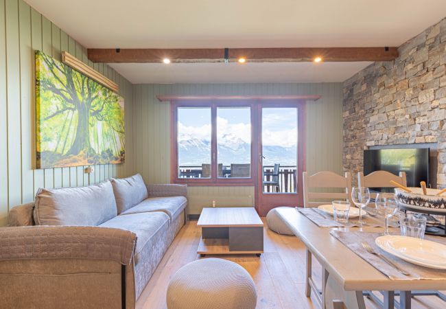 Wohnzimmer Appartement Bellevue L 012 in Veysonnaz in der Schweiz