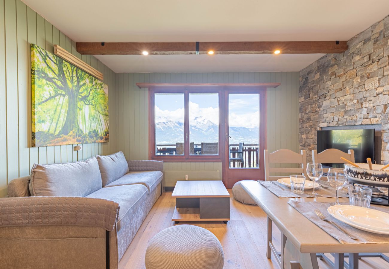 Wohnzimmer Appartement Bellevue L 012 in Veysonnaz in der Schweiz