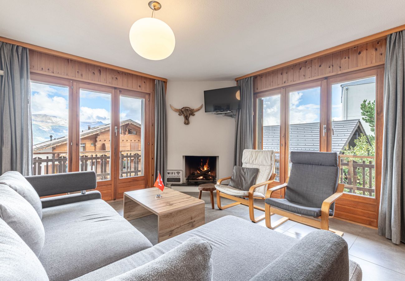 Living room of the Mélèzes R 020 apartment in Veysonnaz, Switzerland
