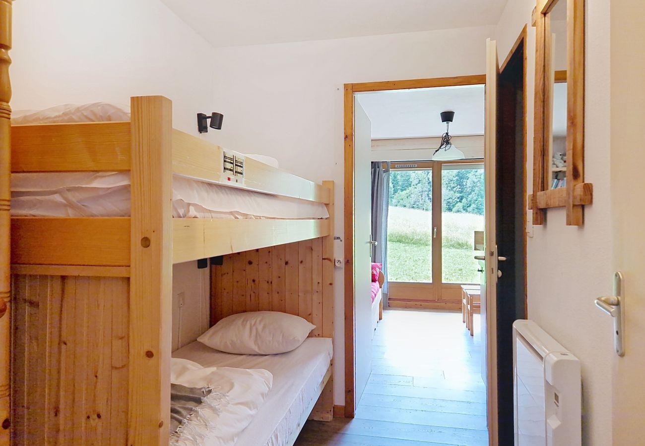 Bright room with bunk beds and mountain view